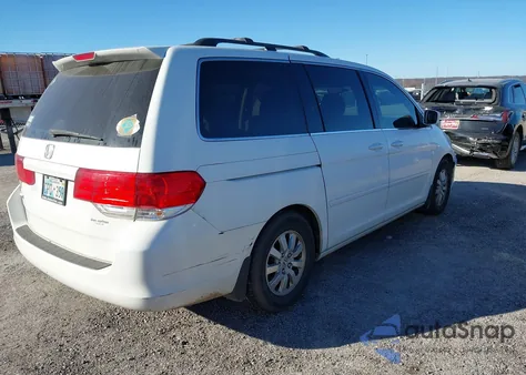 2010 Honda Odyssey Ex-L z USA, uszkodzony, nr VIN 5FNRL3H75AB053149
